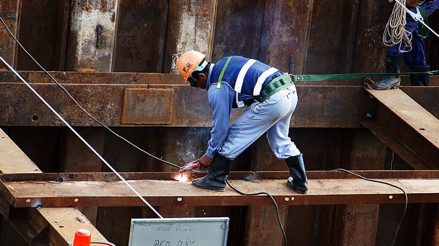 Construction workers put a CAD designer’s bridge building specifications into practice.