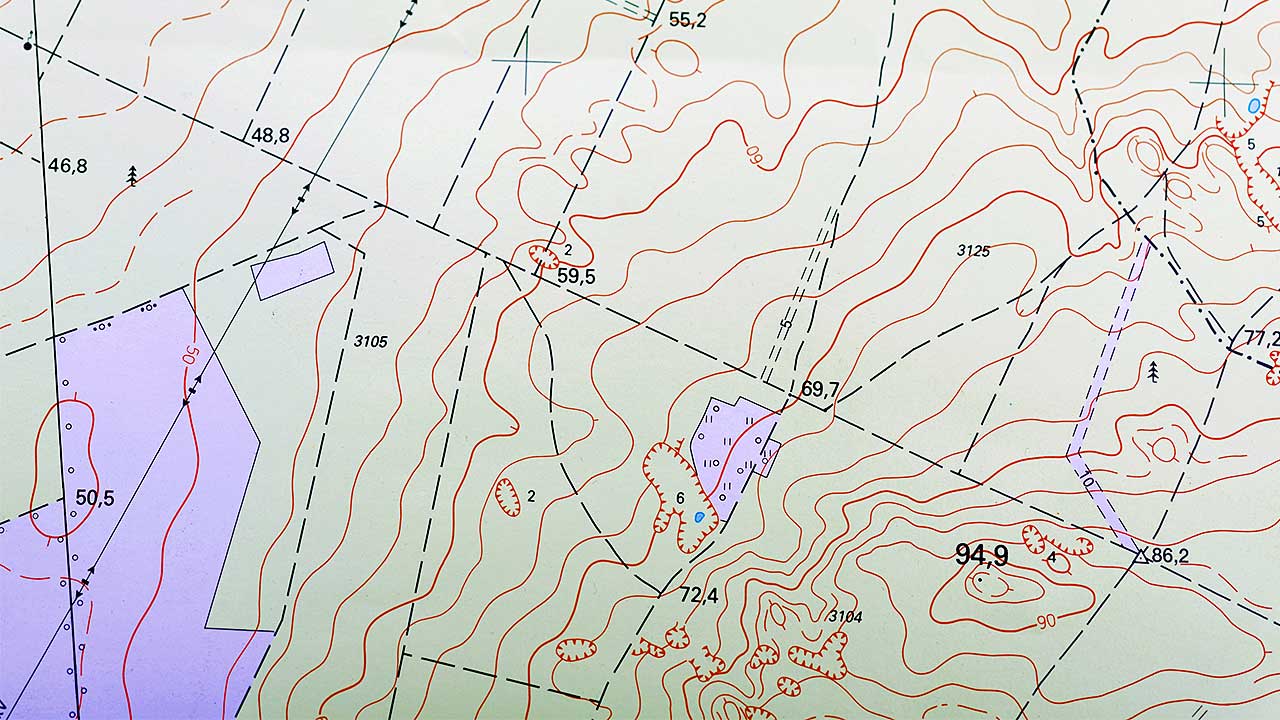 The numbers on contour lines read uphill in ascending order